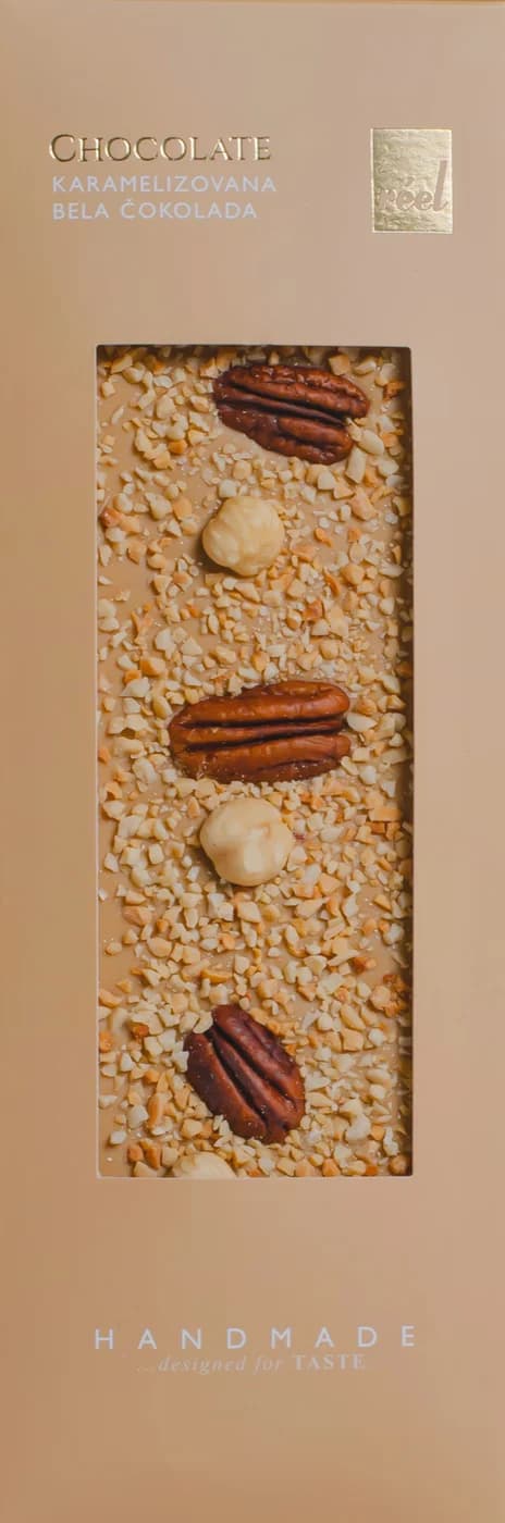 Reel Karamelizovana bela čokolada, lešnik, pekan orah, kikiriki 115g